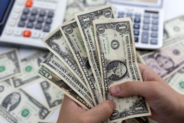 Dollar wobbles ahead of Fed decision Reuters Economy News