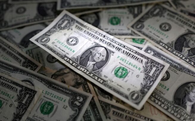 Dollar stands tall in 2024, propped up by cautious Fed, Trump trade Reuters Economy News